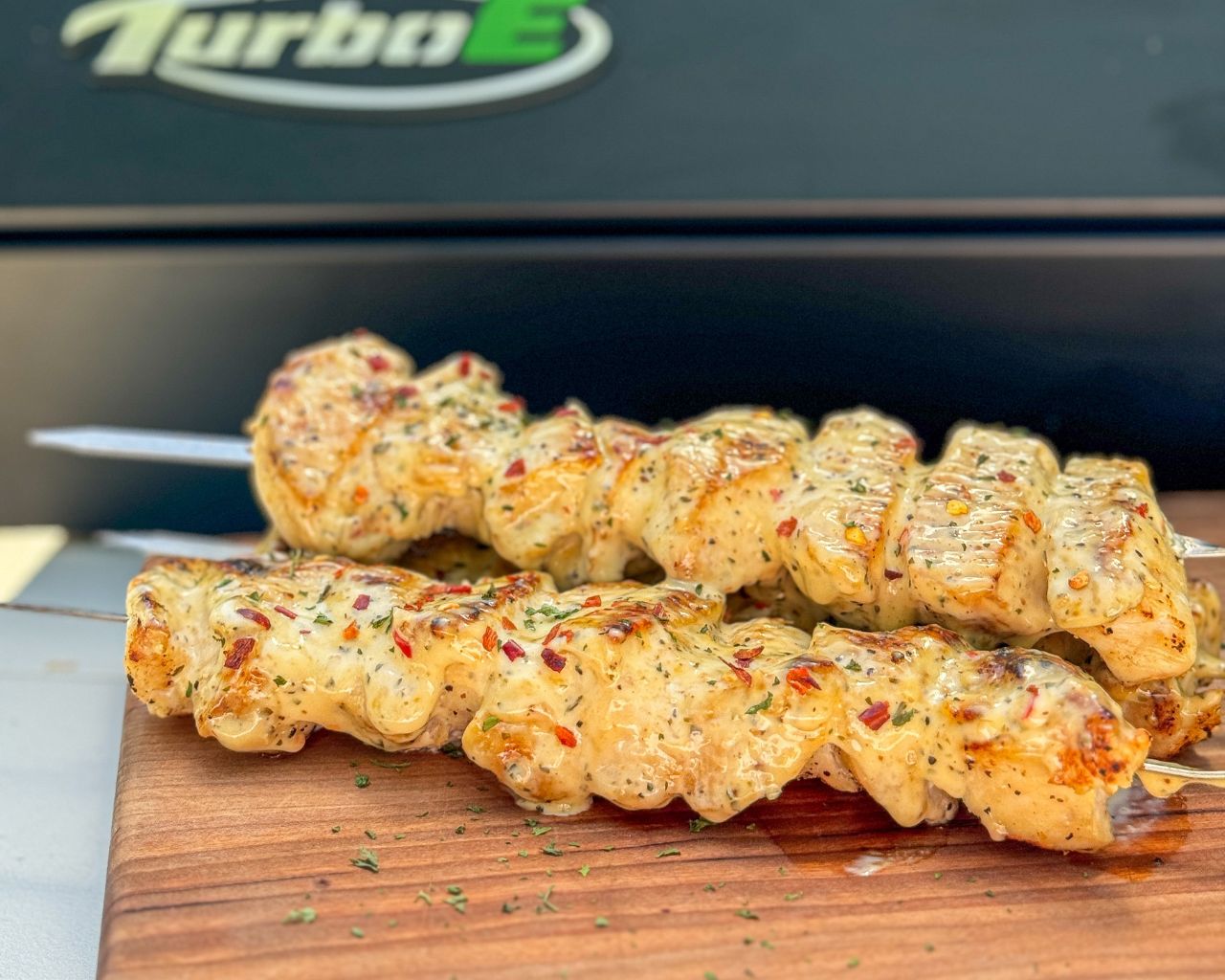 g_bque Brings Backyard Flavor to the Turbo E: Garlic Parm Skewers for Effortless Summer Grilling